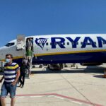 Ryanair jet landed on Mallorca tarmac with travelelrs leaving the plane and headed to the airport.