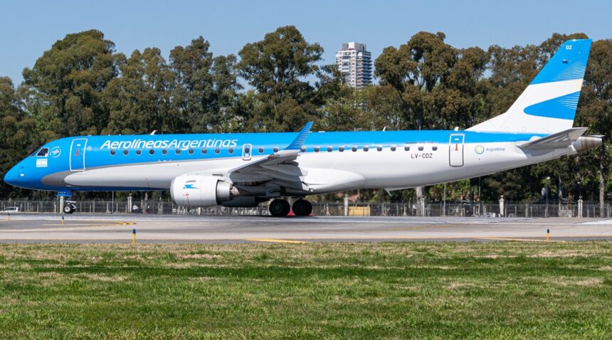 Aerolíneas Argentinas Embraer ERJ aircraft, registration LV-CDZ, taxiing on runway.