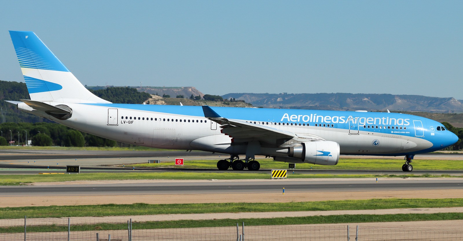 Aerolíneas Argentinas Airbus A330-202 aircraft, registration LV-GIF, taxiing on runway.