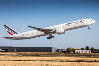 An Air France Boeing 777-300ER aircraft shown on its right-hand side