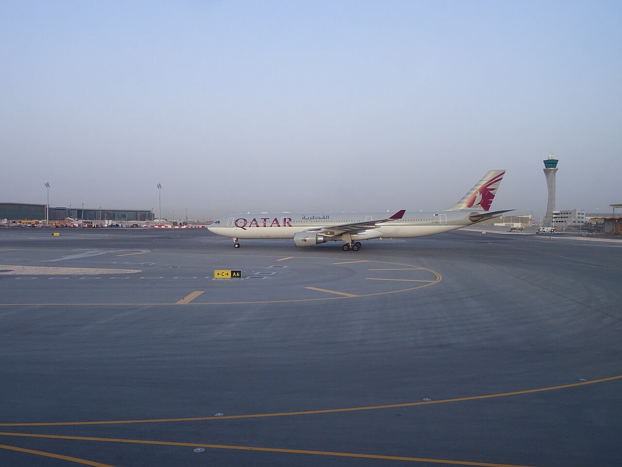A Qatar Airways Airbus A330-300 is taxiing at the Hamad International Airport in Doha