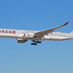 A Qatar Airways Airbus A350-1000 aircraft shown on its left-hand side