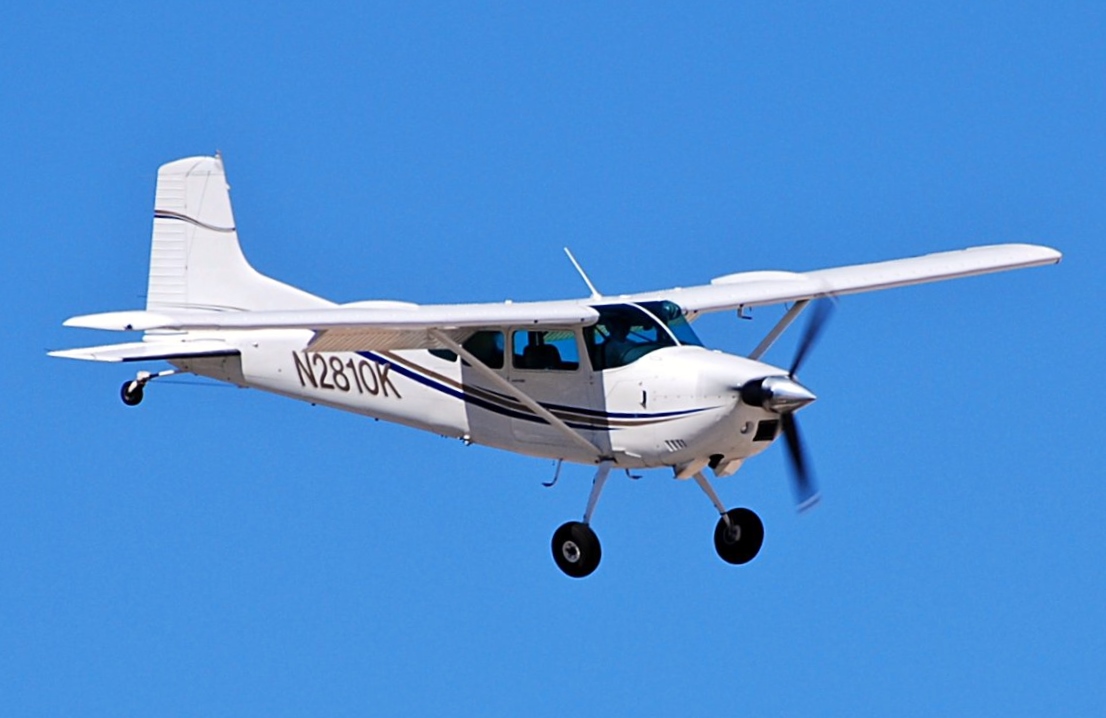 Cessna 180 (registration N2810K) mid flight at North Las Vegas Airport.