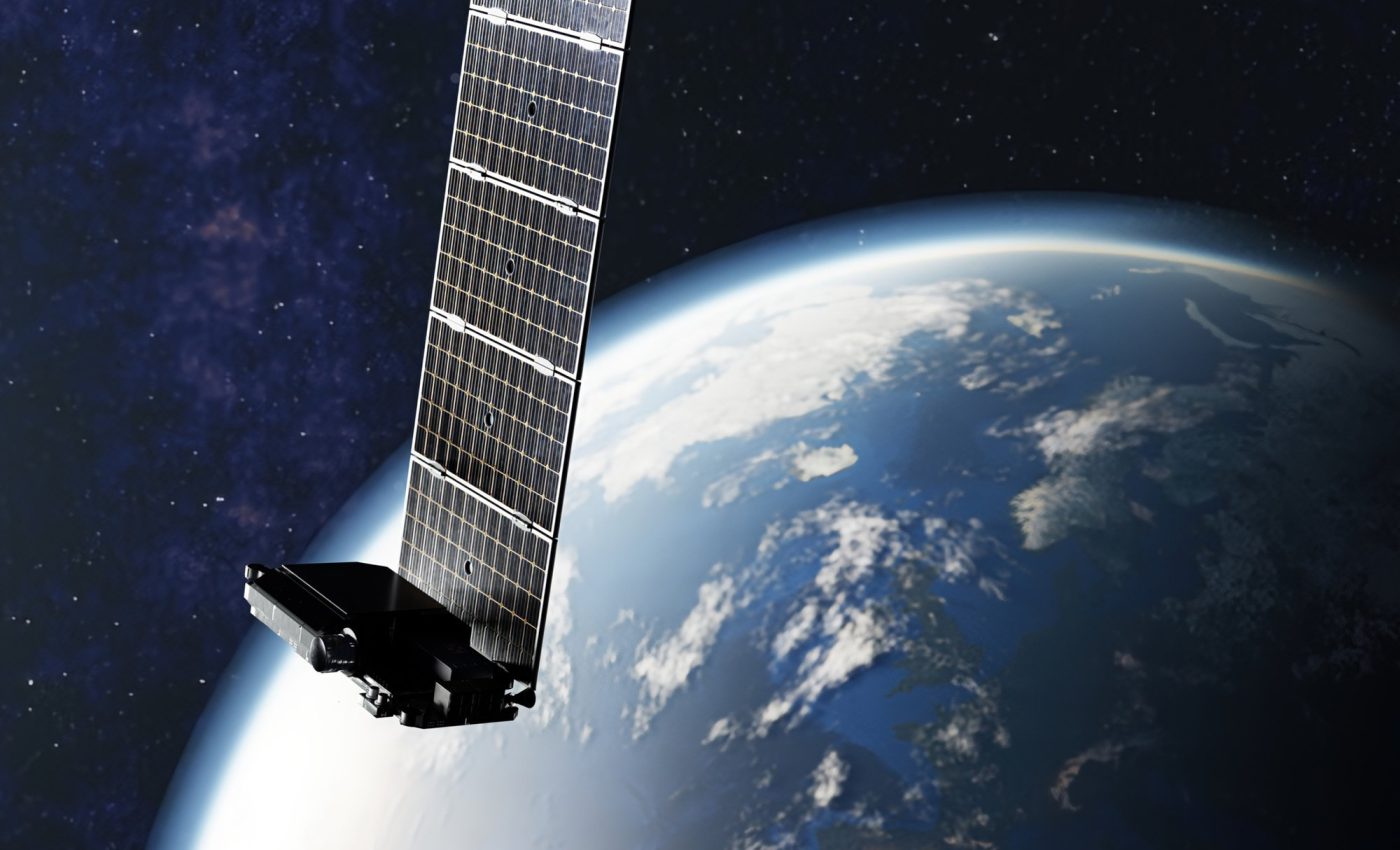 Artist’s impression of a SpaceX Starlink communications satellite – a long, thin metal box with a large solar panel attached – in orbit above the Earth.