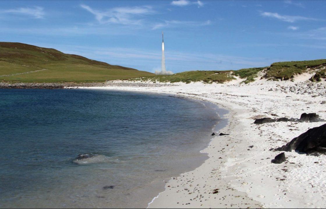 Artist’s impression of a rocket lifting off near a beach in a launch from the proposed Spaceport 1 on the island of North Uist, Scotland.
