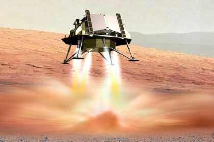 Artist’s impression of the Airbus landing platform – a floating metal structure with downward-facing rocket engines and landing legs – delivering the Rosalind Franklin rover to the Martian surface on a dusty red, desert-like hill.