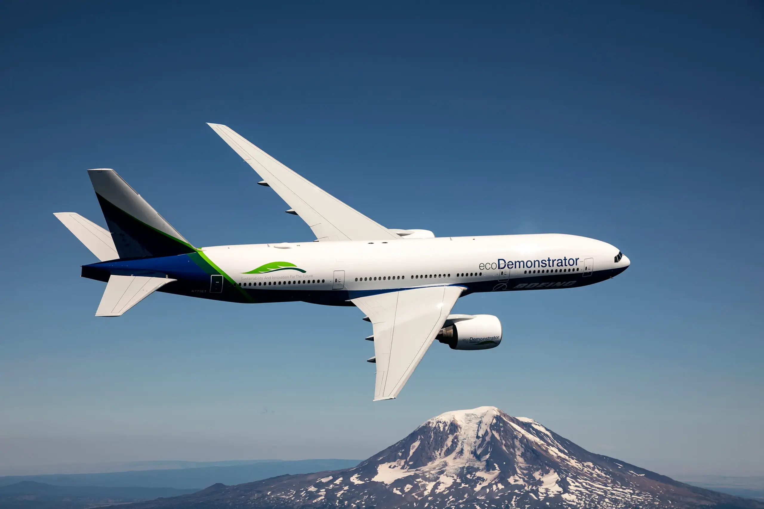 Boeing’s ecoDemonstrator 777, sporting a white and blue livery with a leaf graphic and “ecoDemonstrator” text on the side of the fuselage, is the test bed for new shape-memory alloy technology.