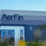 AerFin Headquarters new building, with their navy blue coloured logo and blue ombre theme striped on the building.