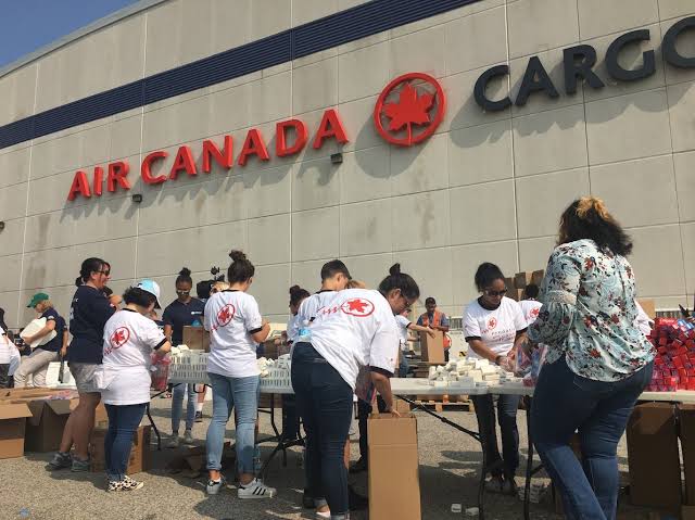 Air Canada Cargo volunteers partner with GlobalMedic to distribute aid which can help those affected by the wildfires in Northern Ontario