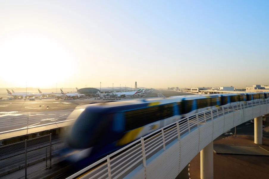 Photograph depicting a train transporting passengers to and from DXB.