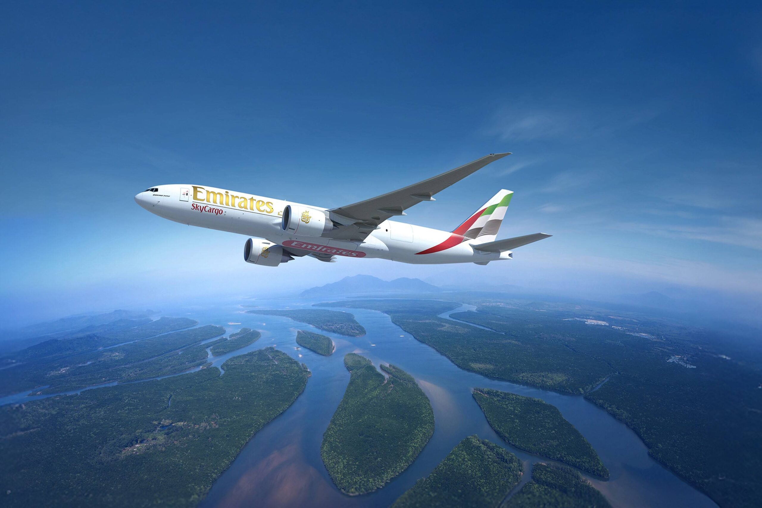 Photograph depicting the exterior of Emirates SkyCargo aircraft at cruising altitude above the delta
