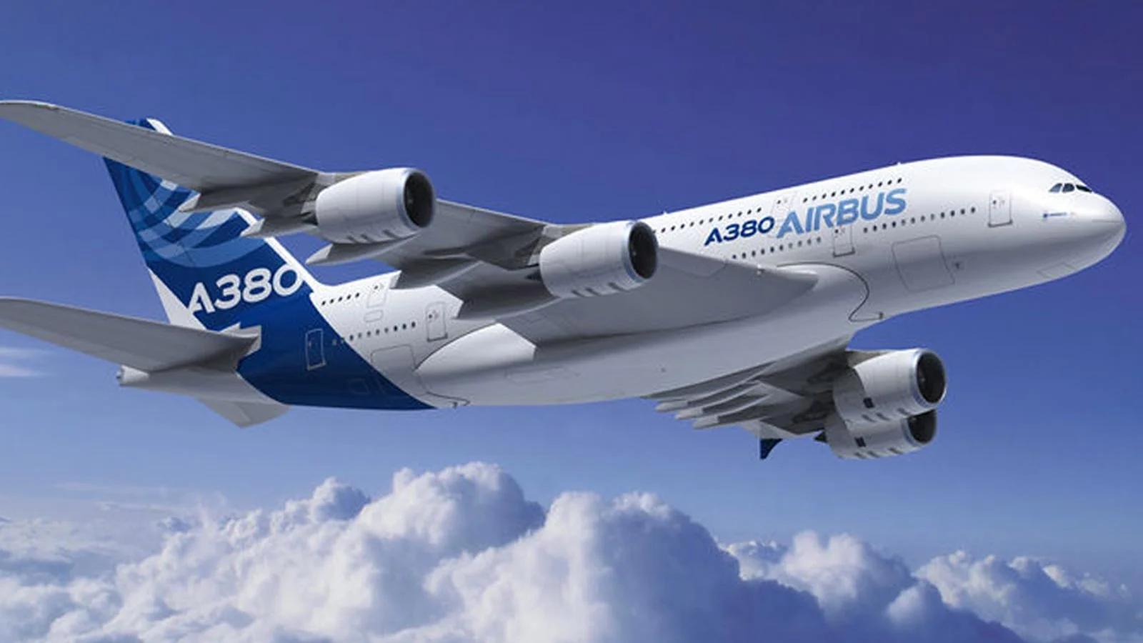 A blue and white Airbus A380 jet flying upwards over a layer of cloud.