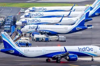 An image of 5 IndiGo planes parked at Mumbai Airport.