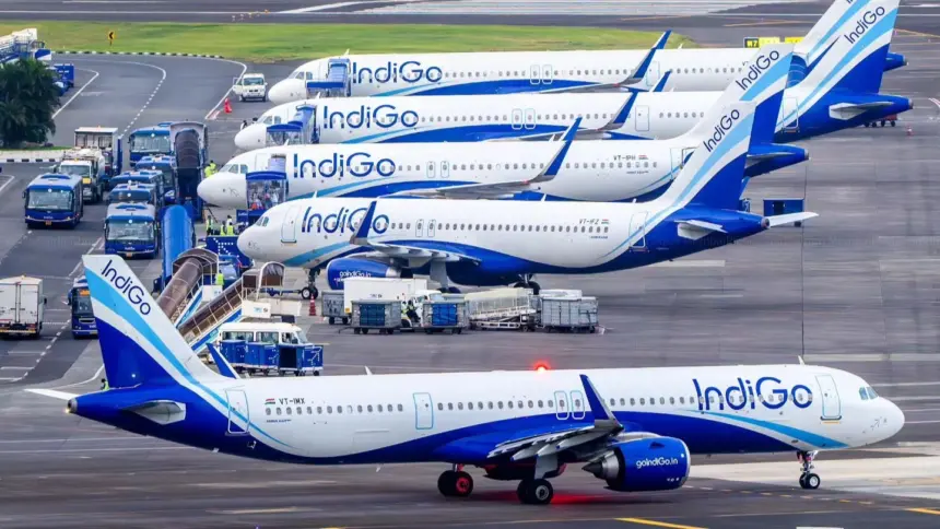 An image of 5 IndiGo planes parked at Mumbai Airport.