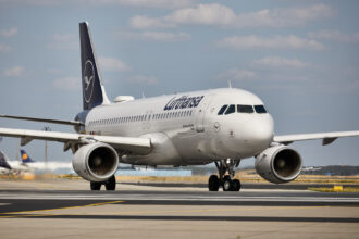 Photograph depicting the exterior of the Lufthansa Airbus A320 on the runway.