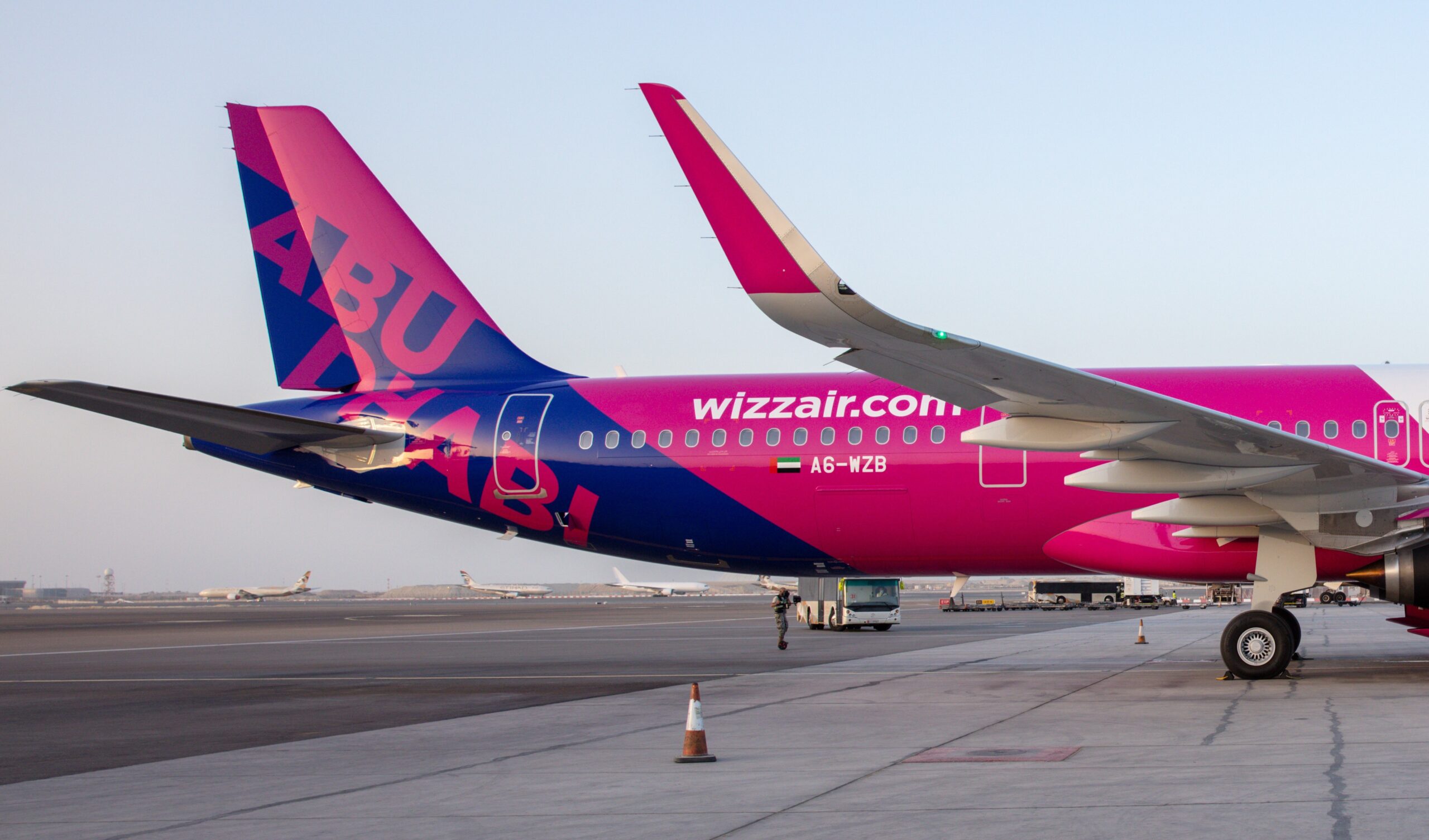 Wizz Air flight stationed at an airport
