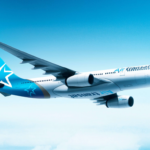 Image shows Air Transat aircraft flying in a light blue sky