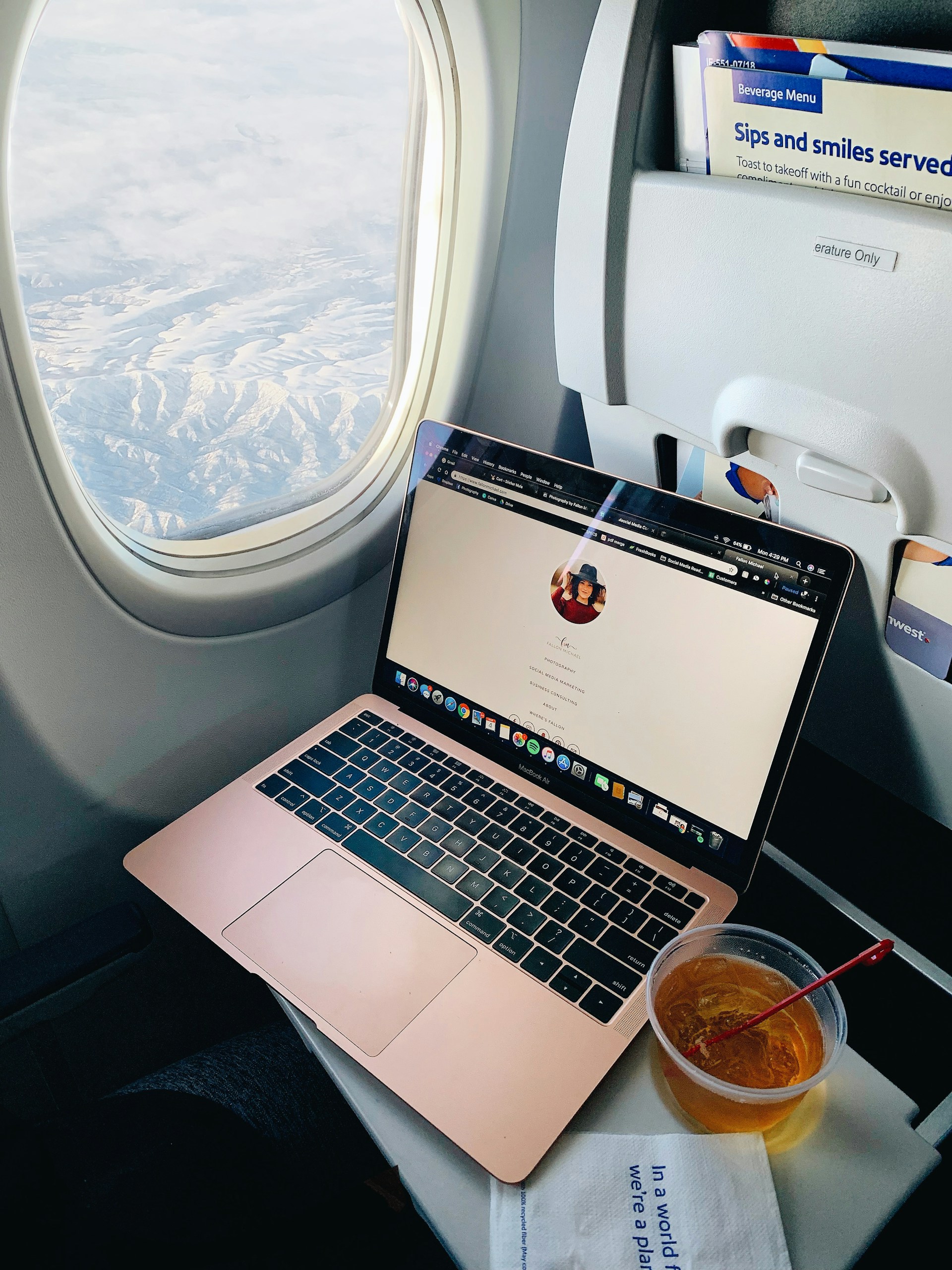 Using a laptop in an aircraft sitting on the aircraft table