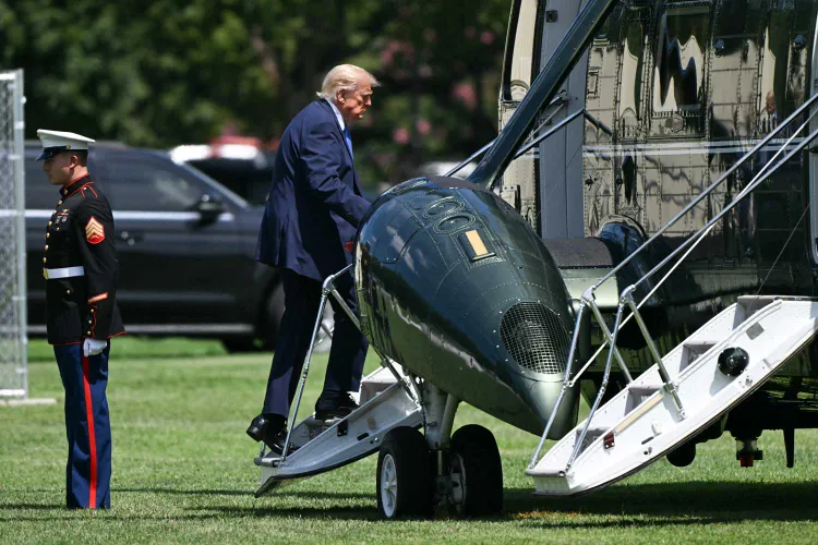 Side view of US President Donald Trump broading military helicopter Marine One on August 4, 2026.