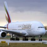 Photograph depicting an Emirates Airbus A380 on the runway of an airport.
