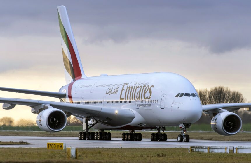 Photograph depicting an Emirates Airbus A380 on the runway of an airport.