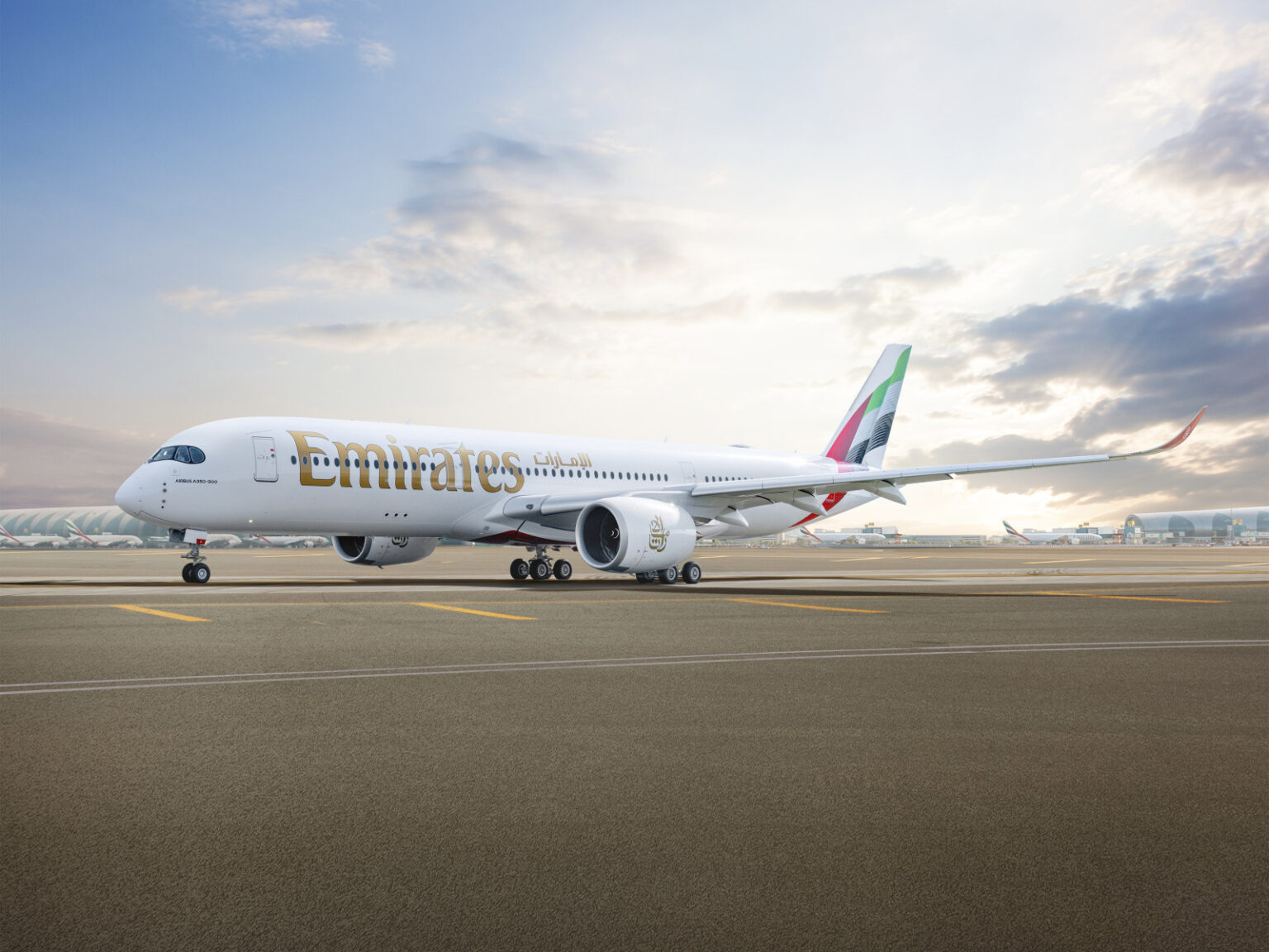 Photograph depicting the exterior of the Emirates Airbus A350 on the runway.