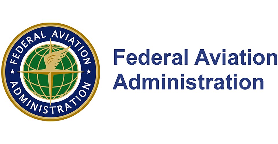 Image depicting the logo of the Federal Aviation Administration (FAA). The logo features a circular design with a blue background, a light green globe, and a gold compass paired with a wing.