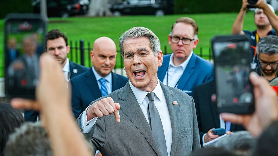U.S. Treasury Secretary Scott Bessent gestures decisively while addressing reporters during an outdoor press