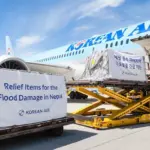 Image shows a Korean Air flight being loaded with emergency relief supplies for Nepal flood victims during the daytime