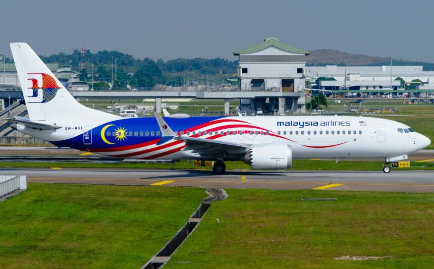 Full body of Malaysia Airlines Boeing 737-8 MAX on the ground.
