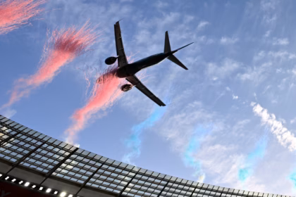One of the Embraer-190 jets flying over DHL Stadium into a cloud of pink dust on Saturday August 29, 2026.