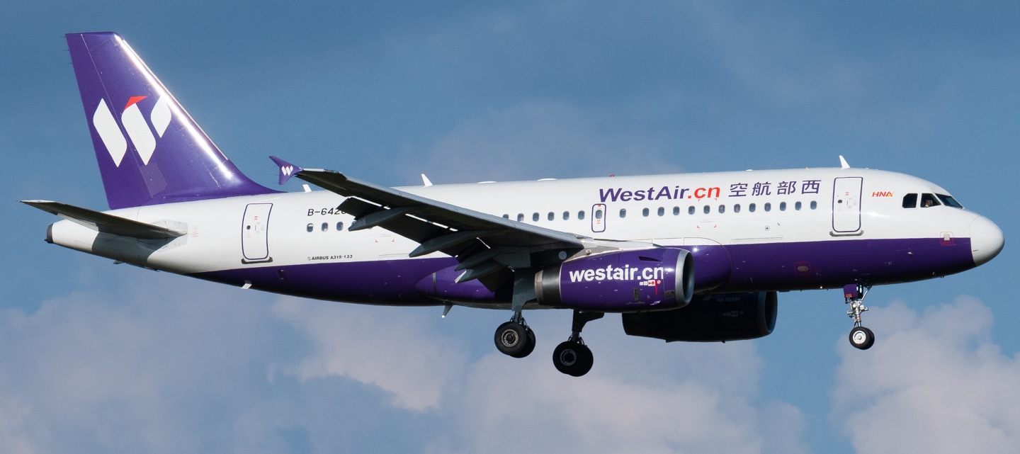Full side view of West Air's Airbus A319-133 with its landing gear extended.