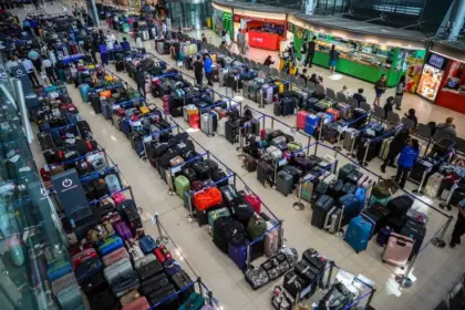 Image shows hundreds of bags lined up at Suvarnabhumi International Airport