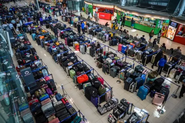 Image shows hundreds of bags lined up at Suvarnabhumi International Airport