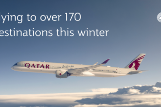 Photograph depicting an airplane flying above the clouds and text stating that Qatar Airways is flying to over 170 destinations this winter.