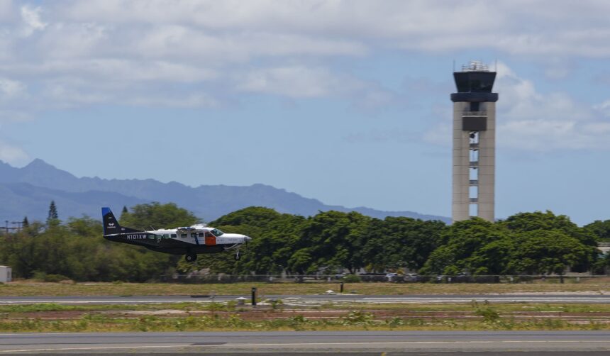 A Joby Aviation Cessna 208B Grand Caravan landing at Joint Base Pearl Harbor-Hickam