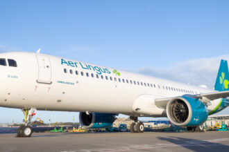 Image shows a grounded Aer Lingus Airbus A321XLR aircraft in Dublin during the daytime with clear blue skies
