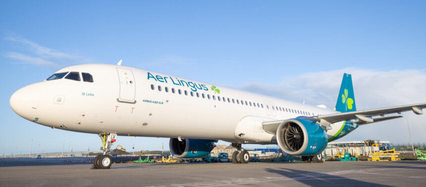 Image shows a grounded Aer Lingus Airbus A321XLR aircraft in Dublin during the daytime with clear blue skies