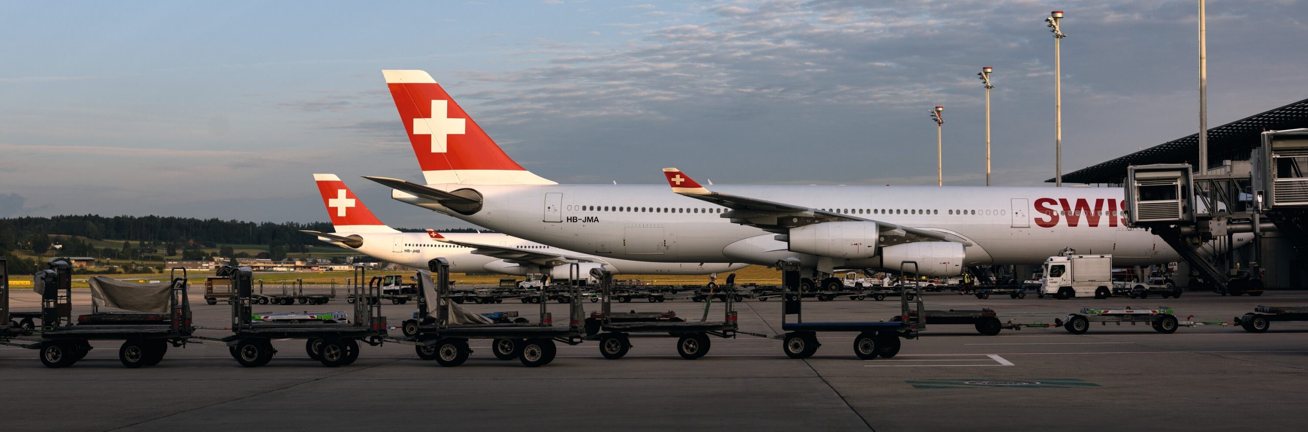 Photograph depicting the exterior of the SWISS Airbus A340. 
