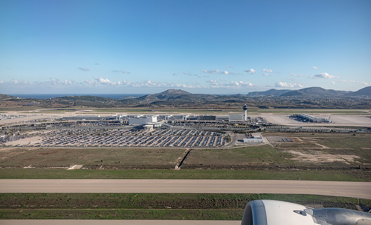 Exterior of Athens International Airport in Greece under a clear sky