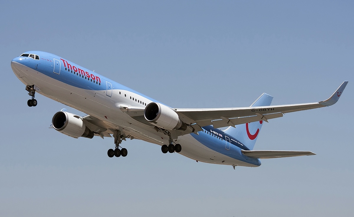 TUI Airways' Boeing 767-300ER with its previous name "Thomson" on the aircraft.