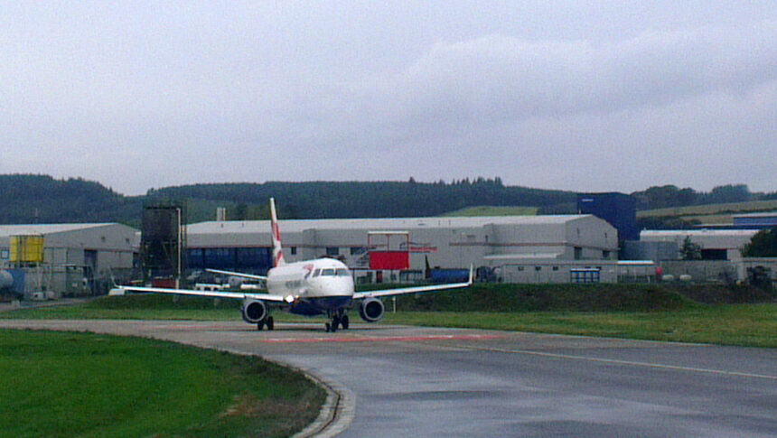 Image shows a British Airways aircraft awaiting its take-off slot at Aberdeen Airport in 2013 on a cloudy day