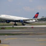 Delta Air Lines Airbus A330-300 descending with its landing gear extended