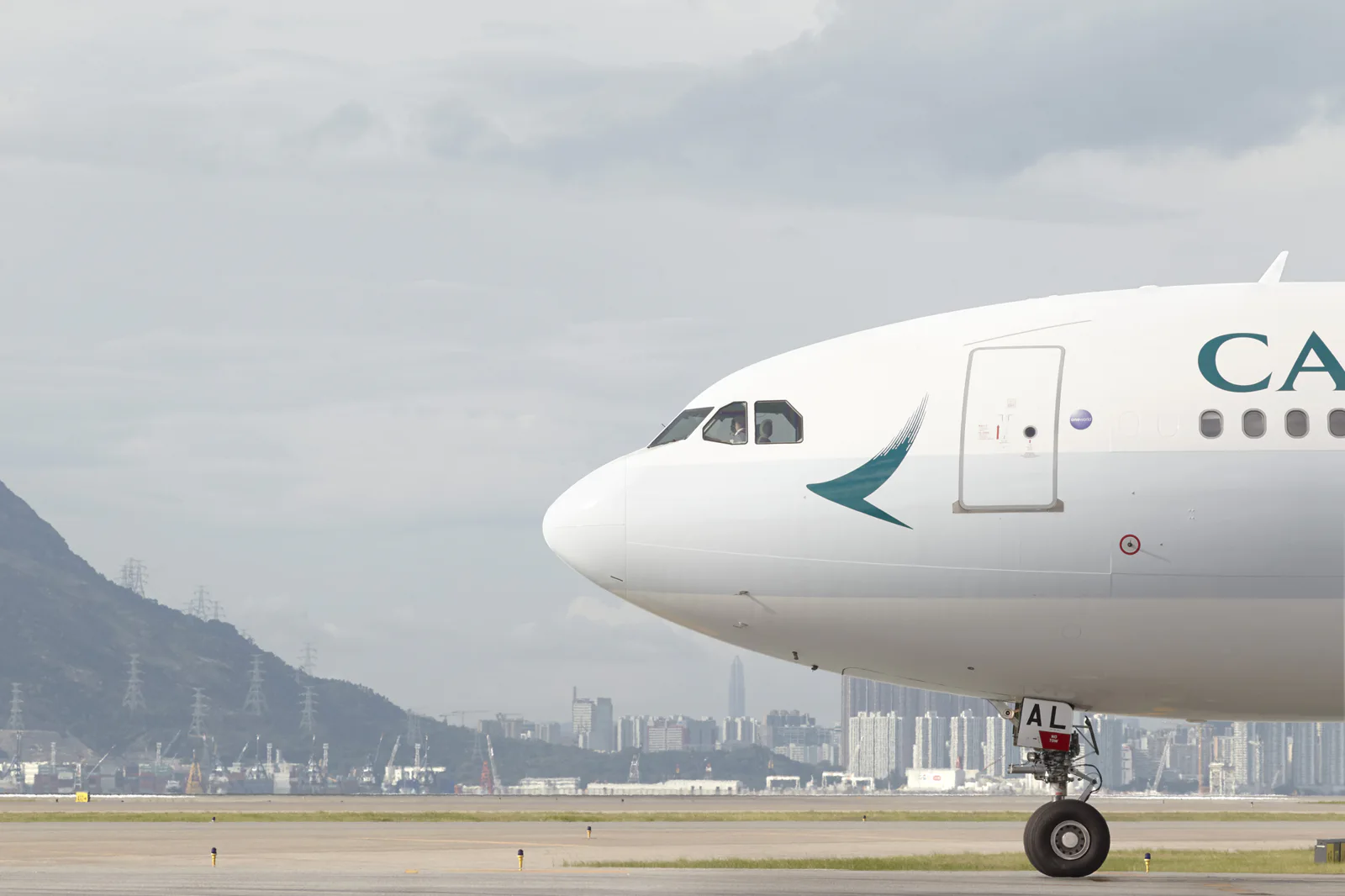 A side profile of the nose section of a Cathay Cargo aircraft on the tarmac