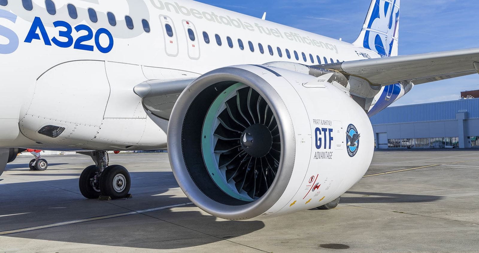 A Pratt & Whitney engine on the side of an aircraft.