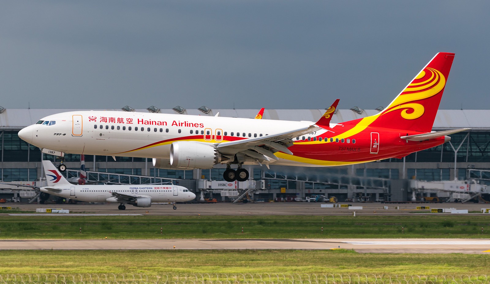 Full side view of Hainan Airlines' Boeing 737 MAX 8 during take off.