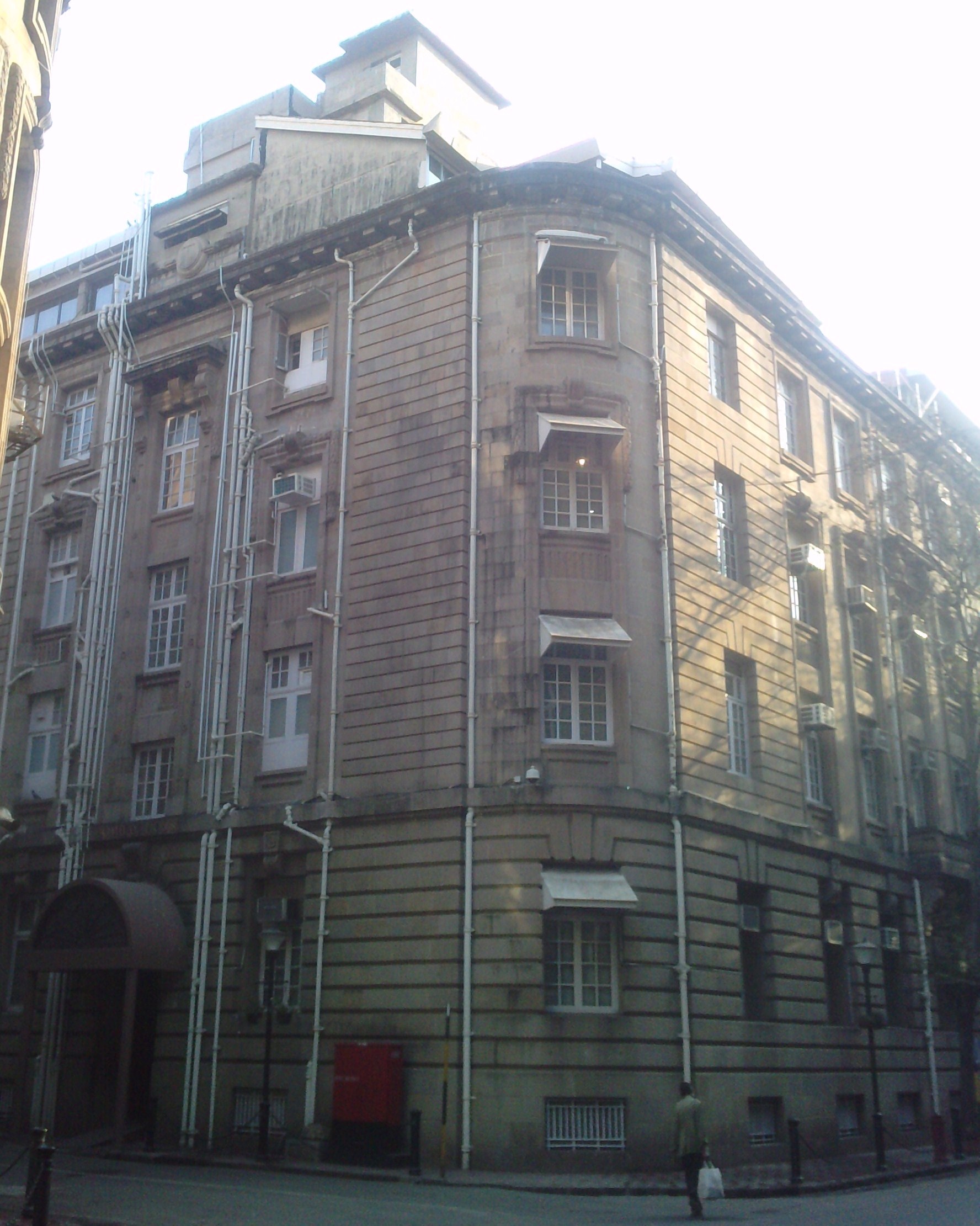 The brown brick building of Bombay House in Mumbai, India.