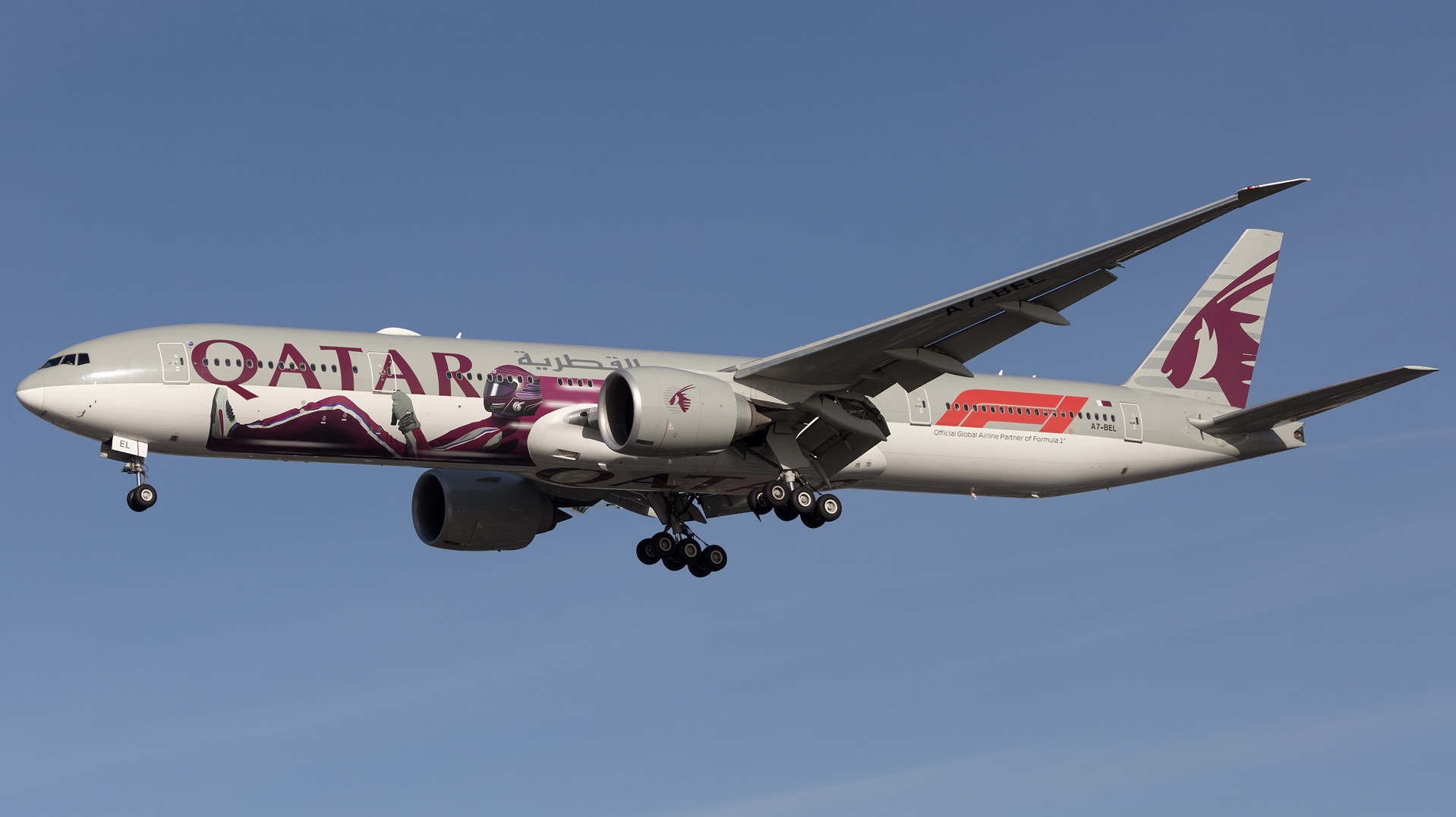A grey, white, and purple Qatar Airways jet flying in front of a clear blue sky.