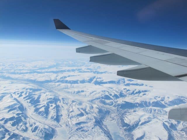 Photo from inside an aircraft looking out of the window.