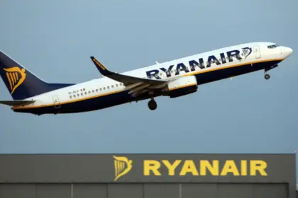 A Ryanair Boeing 737 aircraft from Norwich to Malta on its right-hand side
